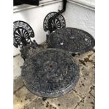 Two metal garden tables and two chairs