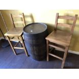 Beer barrel and two tall stools used as bar table
