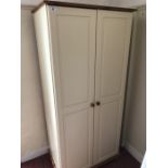 Two door cream painted wardrobe (bed 1)