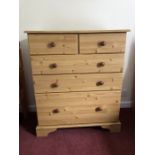 Pine effect five drawer chest of drawers