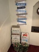 Collection of seaside themed decorative interior signs and artificial ornamental pot plants