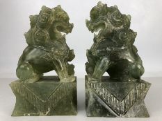 Pair of green stone foo dogs / temple dogs, approx 15cm in height (A/F)