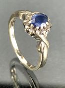 9ct white Gold ring size M set with a dark blue stone