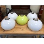 Set of five Mid Century, retro, imitation light shades (plastic) four in white, one in lime green