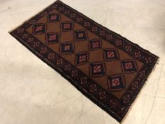 Small rug with geometric design, approx 160cm x 82cm