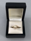 18ct Gold ring with offset mount supporting a large Pearl size 'J' (approx 3.6g)