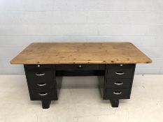 Twin pedestal American 1920s 'tanker' metal desk with replaced pine desk top