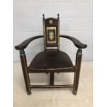 Gothic style painted elbow chair with floral motif