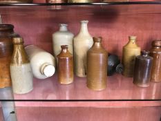 Collection of stoneware bottles and pots