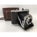 Olympus Six camera with Olympus Zuiko F/3.5 7.5cm lens. Takes 6 x 6 and 4.5 x 6. 1948 - 1956. With