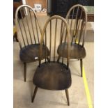 Three Ercol stick back chairs