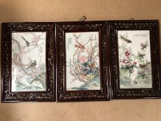 Three Chinese painted porcelain plaques depicting birds and flowers with Chinese writing and