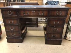 Twin pedestal desk with blue inlaid top and nine drawers, approx 121cm x 61cm x 77cm tall (A/F)