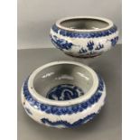 Pair of chinese dragon bowls with four figure character marks to base approx 20cm in diameter