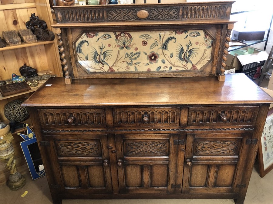 Sideboard with carved detailing to drawers and cupboards with oak upstand with barley twist
