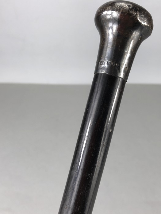 Hallmarked Silver topped black ebonised walking cane Silver hallmarked London 1941 maker WE