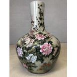 Very large Chinese ceramic bottle vase depicting chrysanthemums, blossom, peacocks and cranes,