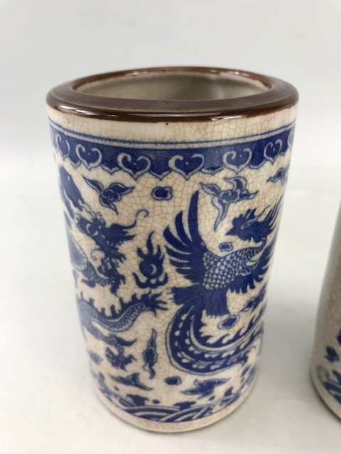 Two Chinese Blue and white Similar brush pots with Brown rims each depicting dragons with - Image 4 of 9