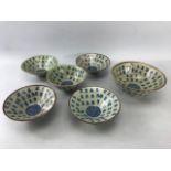 Collection of Chinese crackle glaze bowls and decorated all over with Chinese characters and six