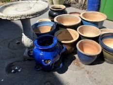 Collection of coloured pots and a birdbath