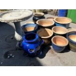 Collection of coloured pots and a birdbath