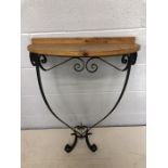 Half moon hall table with scrolled metal base and wooden top