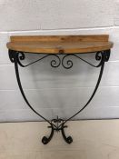 Half moon hall table with scrolled metal base and wooden top