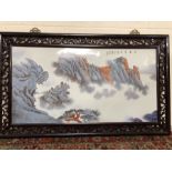 Large painted porcelain plaque depicting a mountainous scene with Chinese writing and character