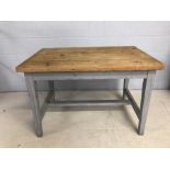 Small pine topped kitchen table with painted legs, approx 115cm x 74cm x 76cm tall