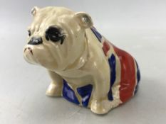 Royal Doulton British Bulldog with Union Flag Rd. Nos. 645,658 H10cm (chip to left paw)