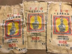 Three original 45kg Chinese rice sacks bearing the emblem for 'China Chef'