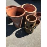 A good collection of aged Terrecotta pots to include a Strawberry pot