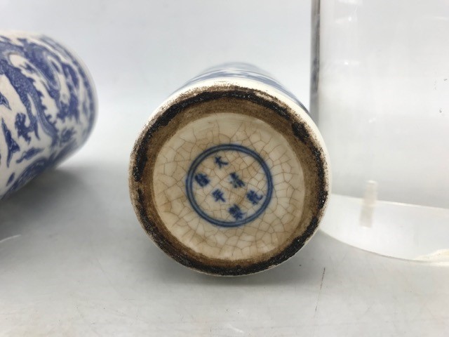 Two Chinese Blue and white Similar brush pots with Brown rims each depicting dragons with - Image 8 of 9