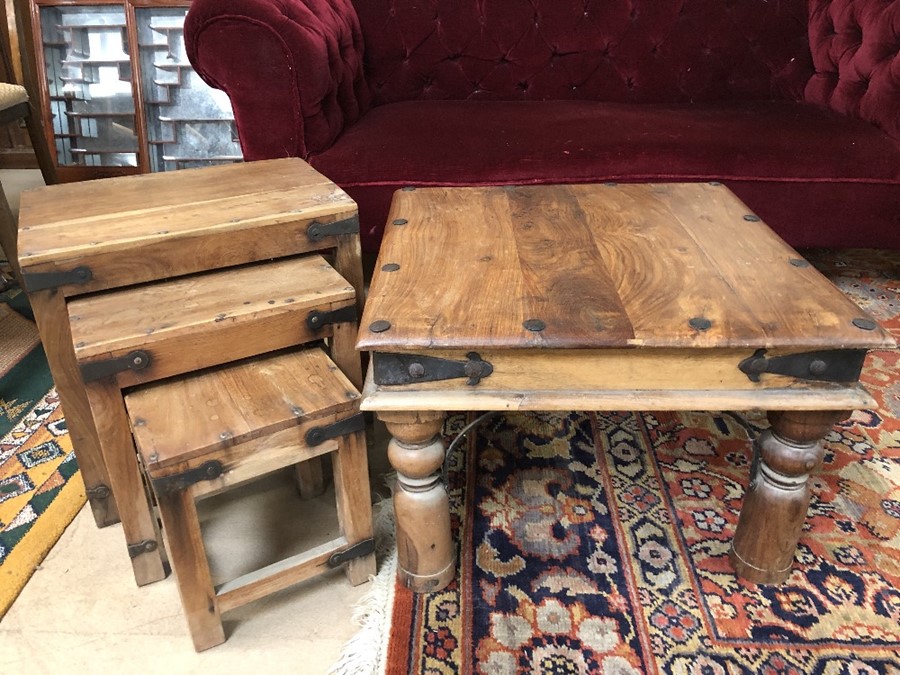 Mexican pine square coffee table along with a next of three occasional Mexican pine tables