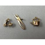 three 9ct Gold Bracelet Charms total weight approx 3.4g