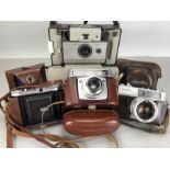 Collection of four vintage cameras to include Polaroid 103 Land Camera, Baldix Balda, Minolta Hi-