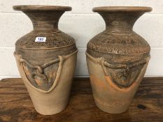 Pair of Eastern urns (one A/F), each approx 48cm in height