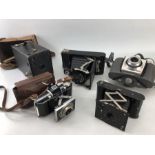 Collection of five vintage Kodak cameras to include: Eastman Rochester, New York vest pocket
