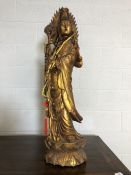Large wooden carved and gilt Hindu figurine of a deity