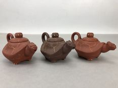 Three Yixing teapots in the shape a tortoise / turtle, approx 6cm in height