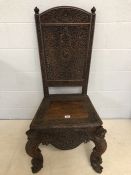 Vintage Burmese solid teak heavily carved side chair, approx 119cm height at back