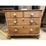 Antique pine chest of four drawers on turned feet, approx 100cm x 46cm x 85cm tall