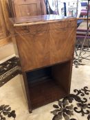 Side table with lid opening to reveal a sewing box