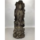 Wooden carved hard wood Tibetan shrine with carved buddha enveloped in a leaf, approx 49cm in