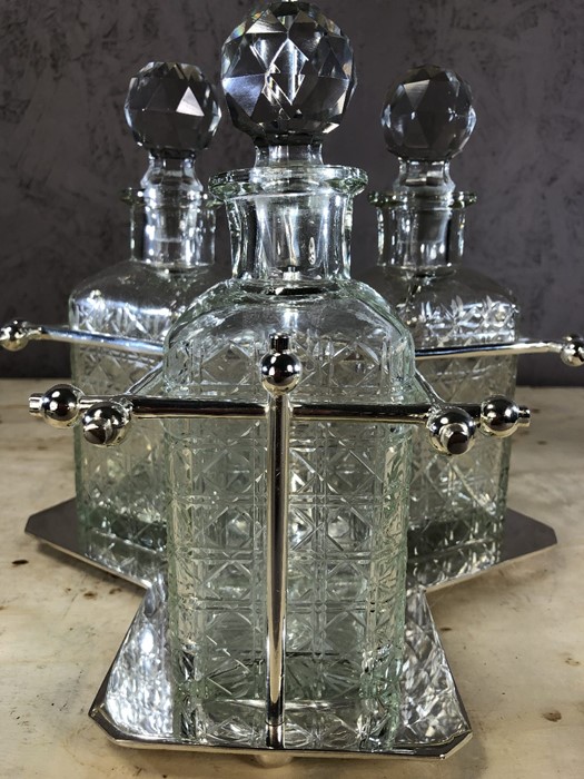 Dresser style silver plated three decanter tantalus, decanters approx 23cm in height - Image 4 of 5