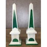 Pair of decorative stone obelisks in green and white, each approx 42cm in height