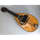 Wooden mandolin, approx 63cm in length