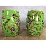 Pair of green porcelain barrel seats / stools with floral and bird design, approx 45cm in height