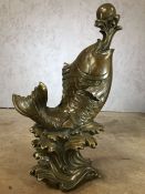 Large brass model of a fish with ball, approx 40cm in height