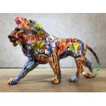 Decorative figure of a lion with graffiti design, approx 23cm in height